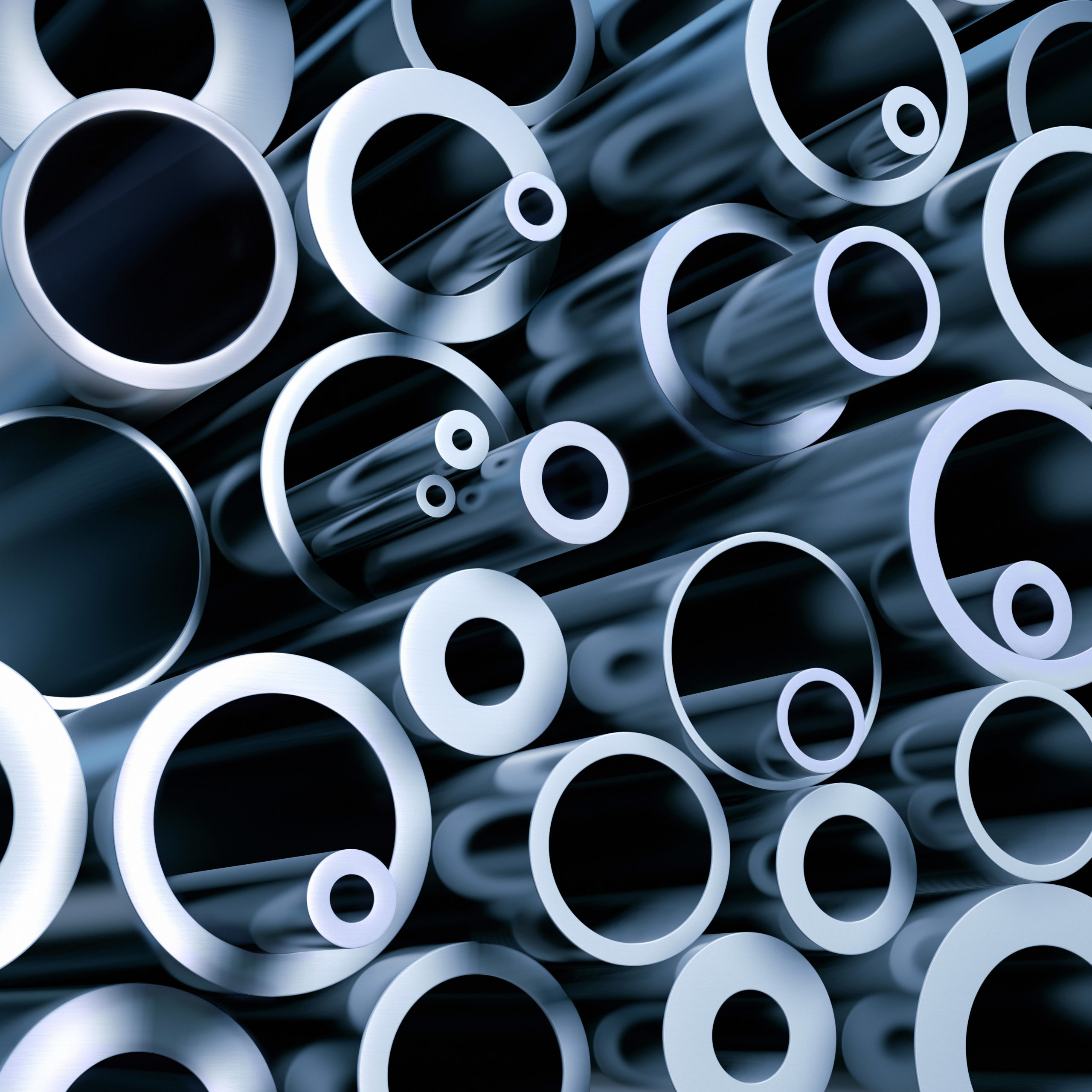 a stack of various metall pipes